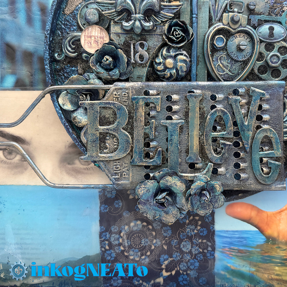 "Believe" is a powerful mixed media artwork exploring faith, resilience, and unseen forces. Layered with encaustic wax, ethereal textures, and found objects, this piece evokes strength and wonder.
