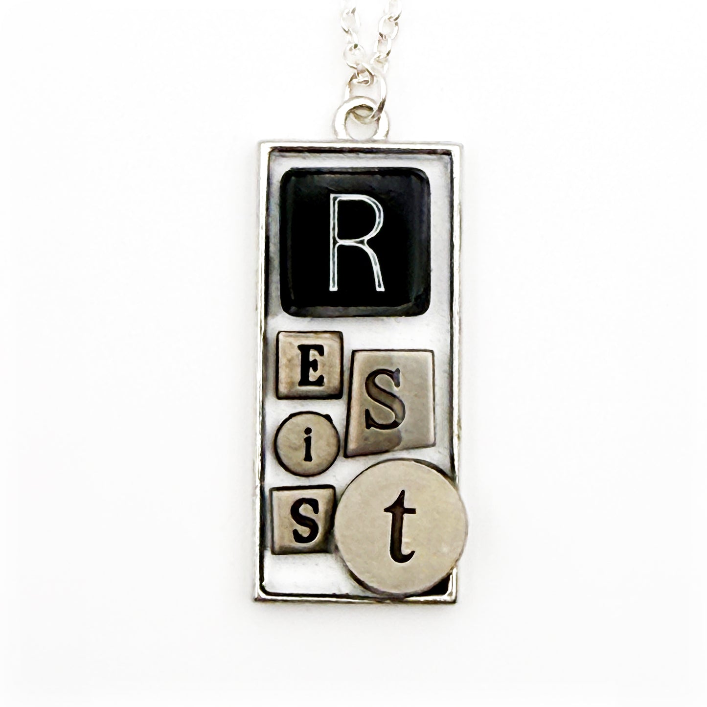 RESIST Necklace – Silver Mixed Metal Bezel | Wearable Art Word Jewelry